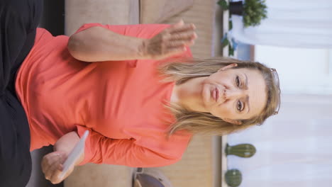 Vertical-video-of-Angry-woman-with-high-bill.